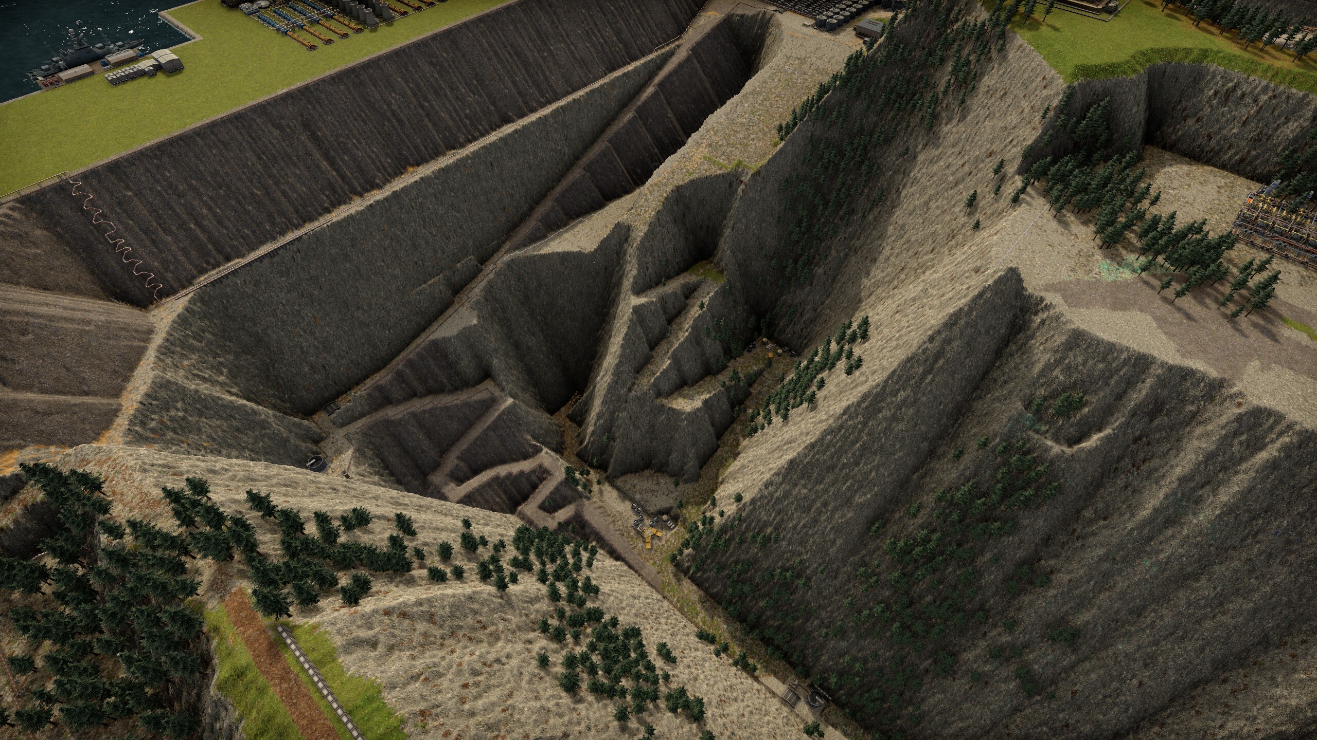 The depth of the mine gets more visible when you look down at the tiny haul trucks. It also feels so naturally laid out that following a truck driving up & down is a true joy.