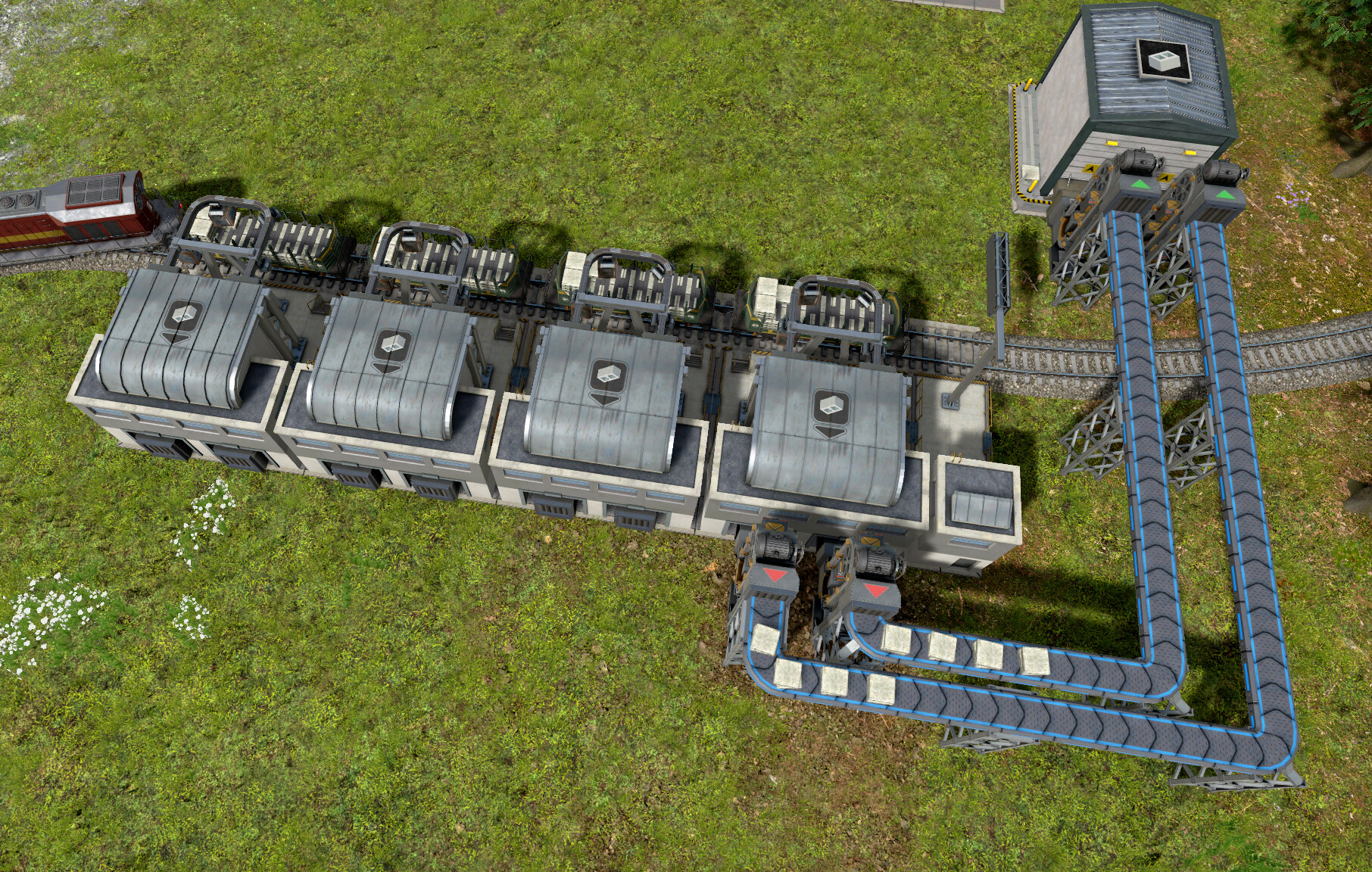If uploading throughput is not a concern, trains can be fully unloaded just by connecting one module to the conveyor belts.