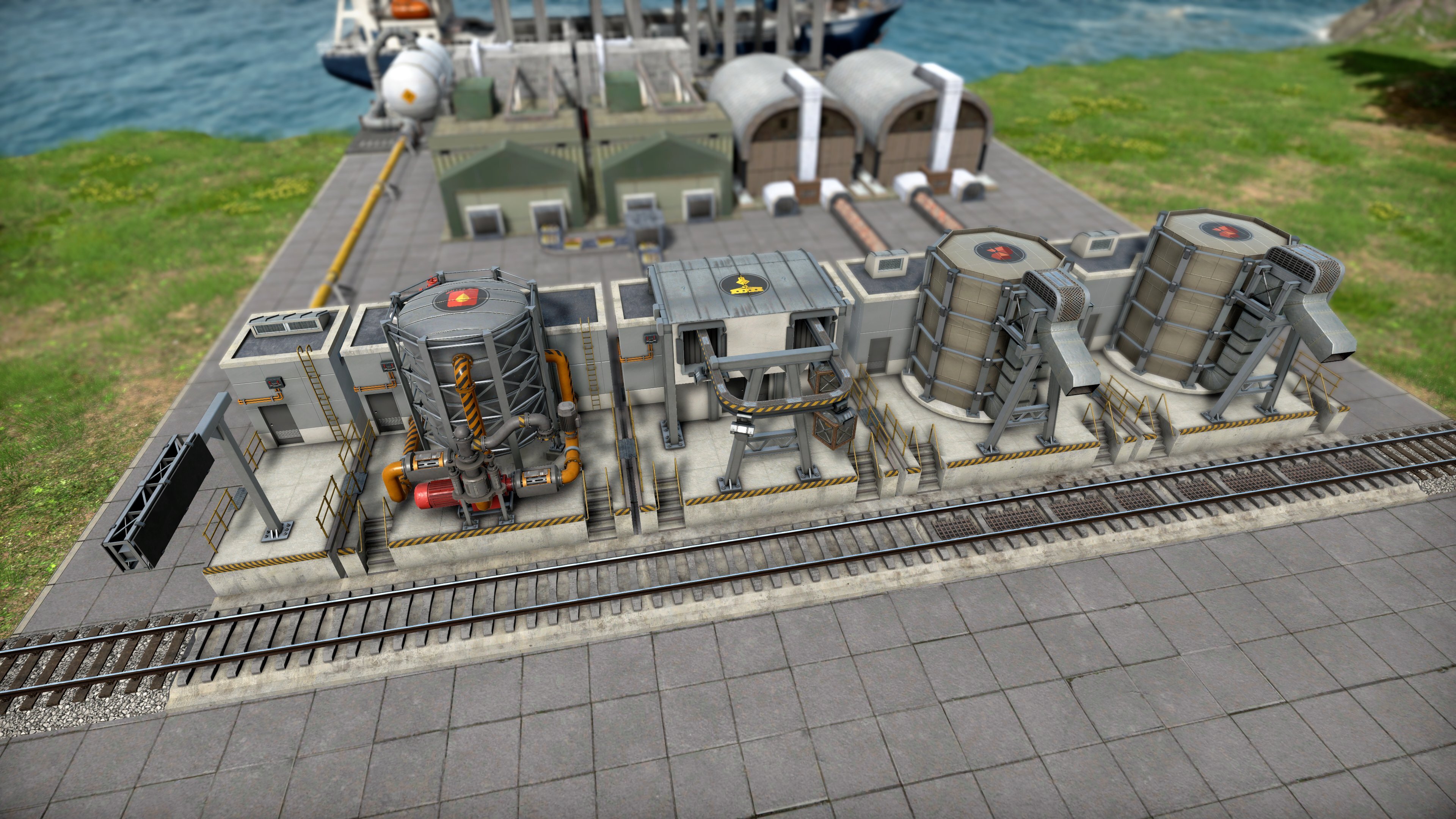 Modular train station connected to a cargo dock.