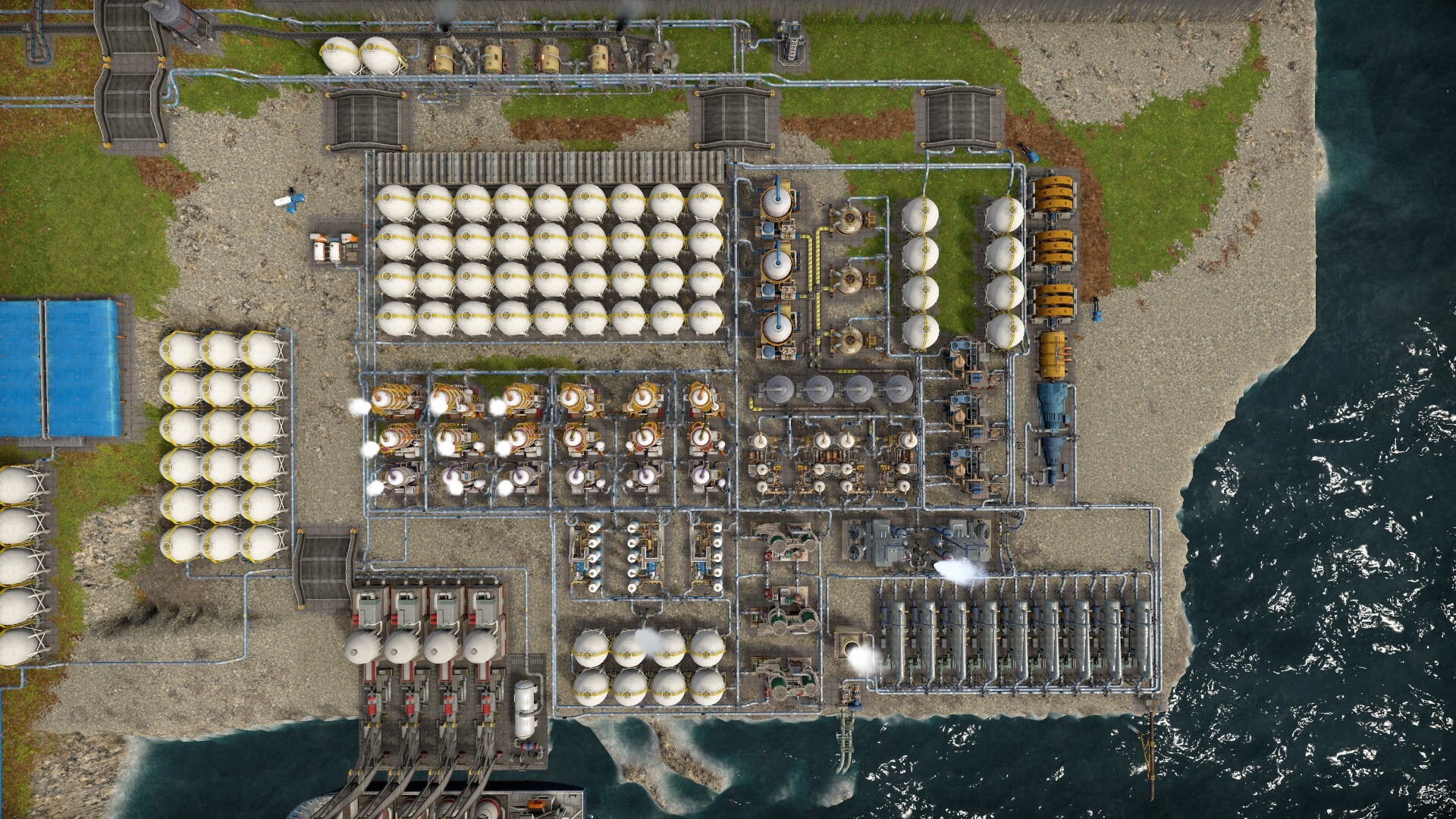 Screenshot of a refinery with a massive array of storages (white balls) from Blottoo.
