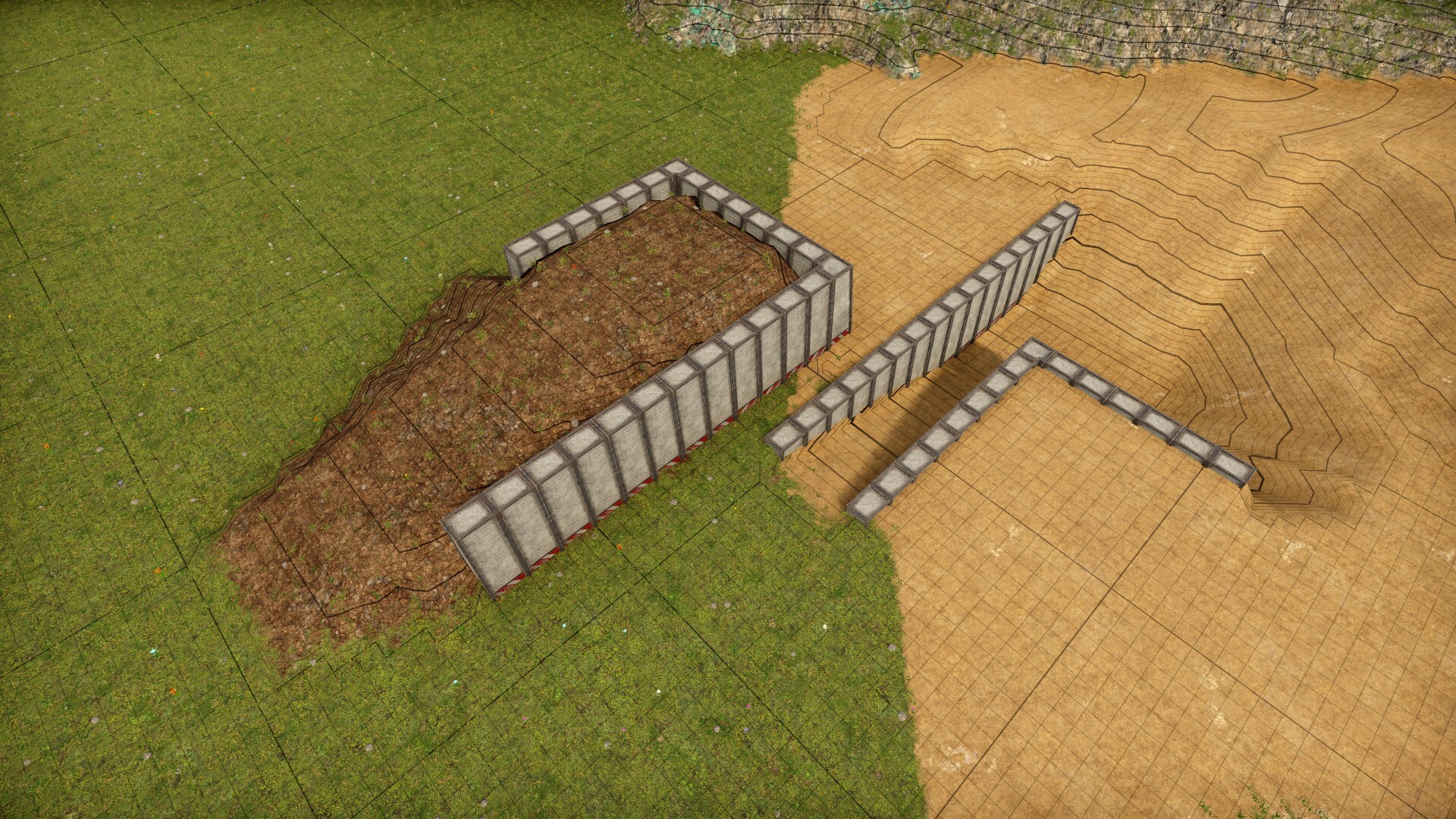 Retaining walls holding sand mine as well as dumped dirt pile.